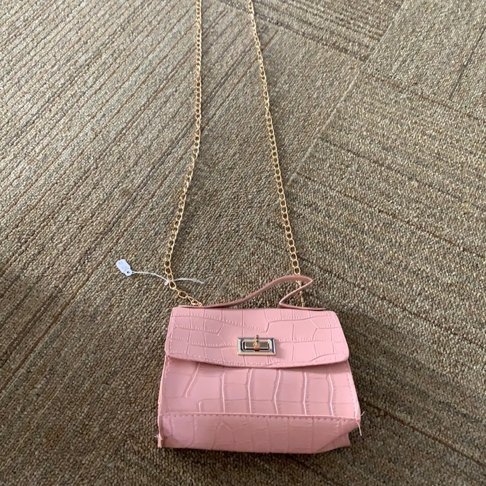 Brand new pink cross body purse